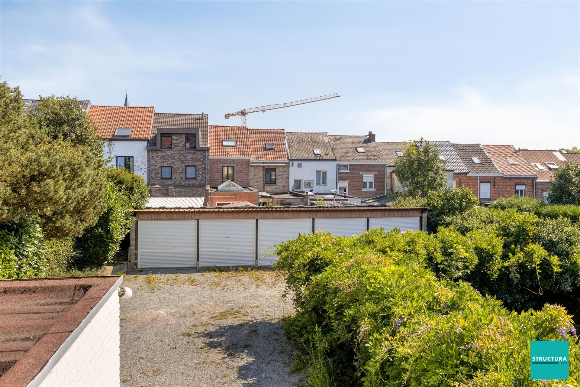 Opbrengsteigendom met 2 appartementen + 6 autostallingen foto 4