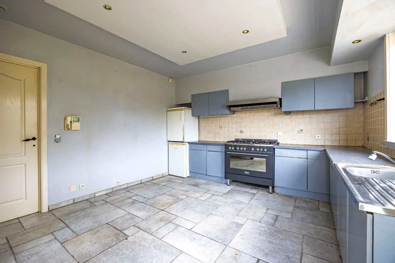 Mooie eigendom op 446 m² met goede locatie - 3 slaapkamers, garage, tuin foto 11