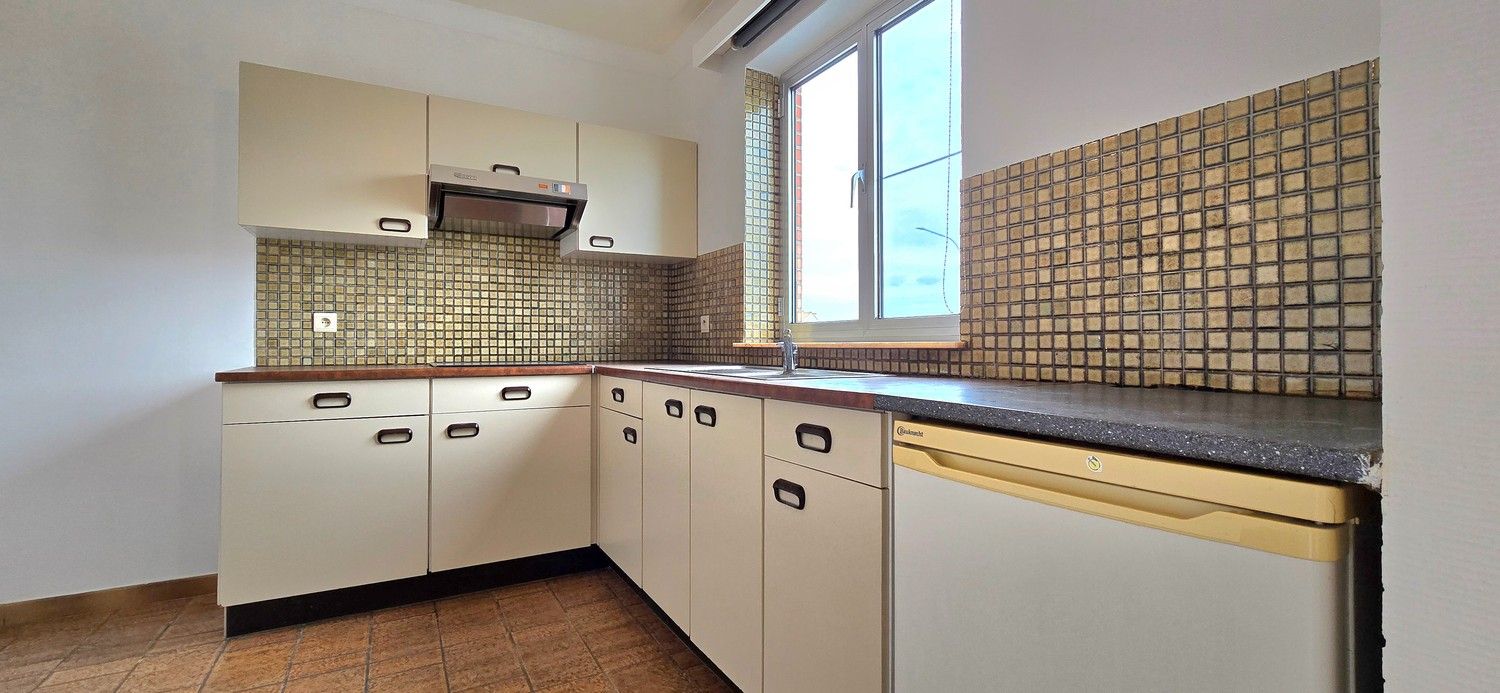 Instapklaar 2-slaapkamer appartement met garage, autostaanplaats en kelderberging foto 8