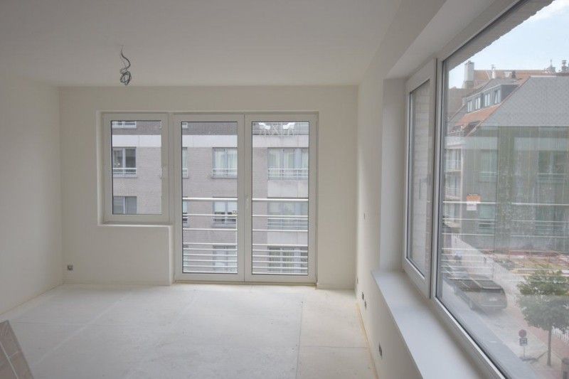 Lichtrijk, gemeubeld appartement met twee slaapkamers te koop op top locatie!  foto 1