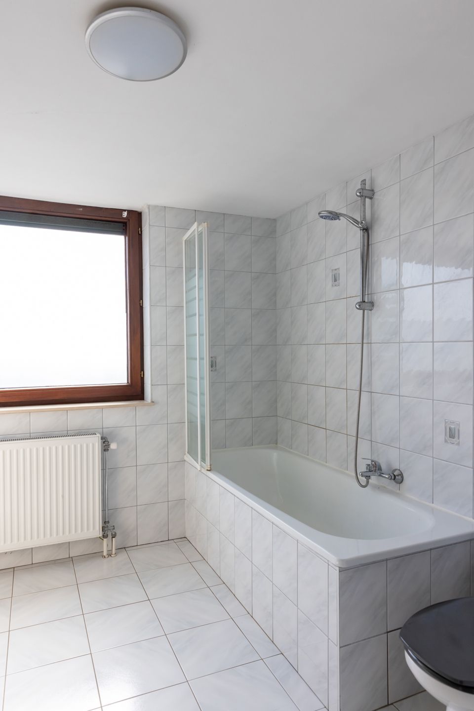 Instapklaar duplex-appartement met 2 slaapkamers en ruim terras in hartje Bornem foto 8