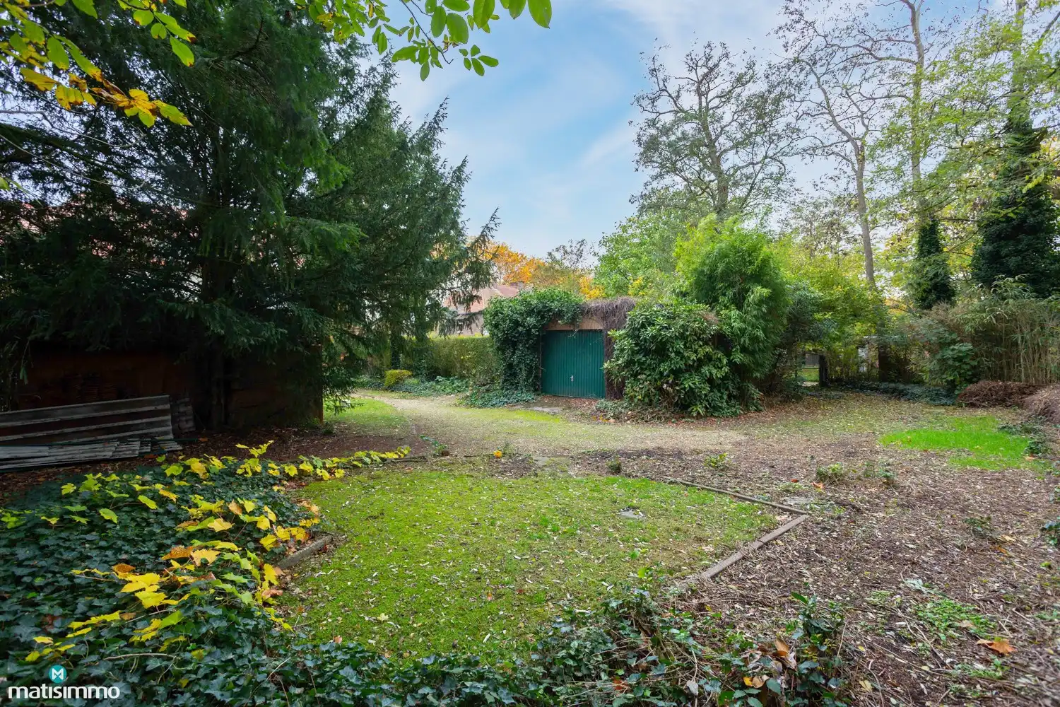 KARAKTERVOLLE WONING MET 5 SLAAPKAMERS EN RUIM PERCEEL TE GENK foto 44