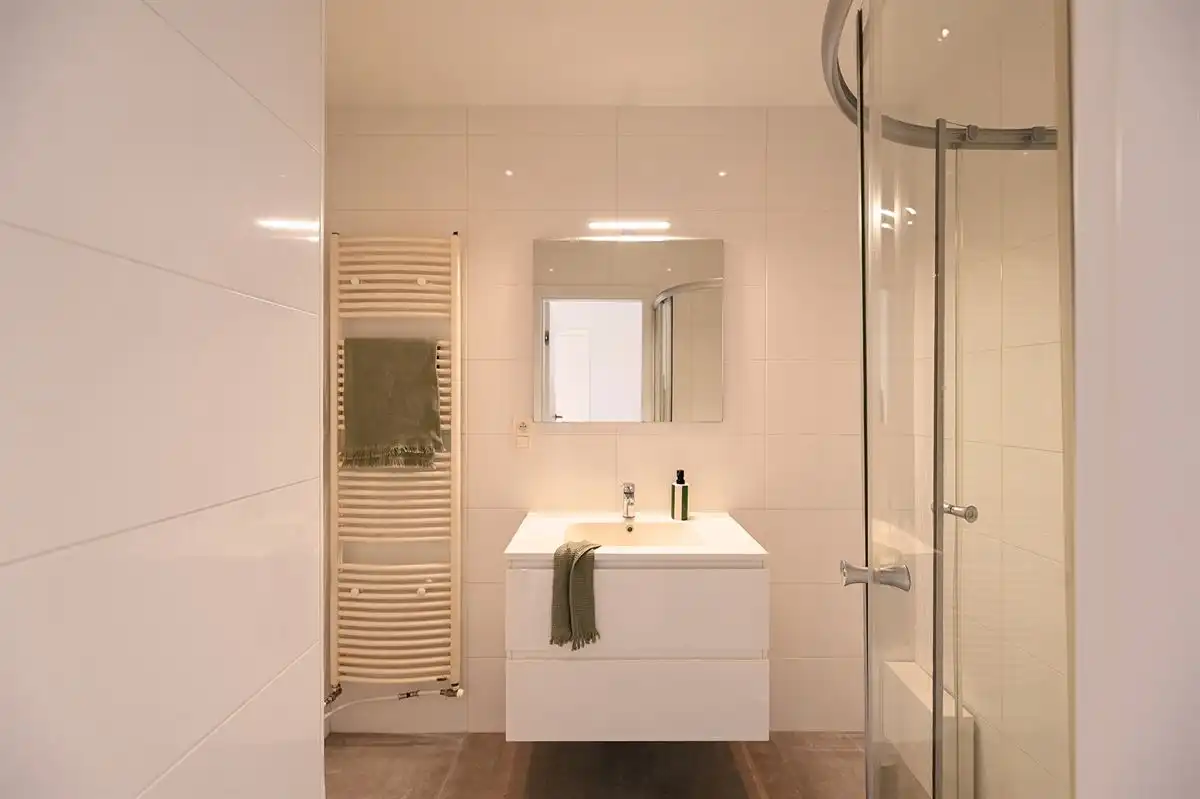 Lichtrijk hoekappartement in hartje Brasschaat foto 17