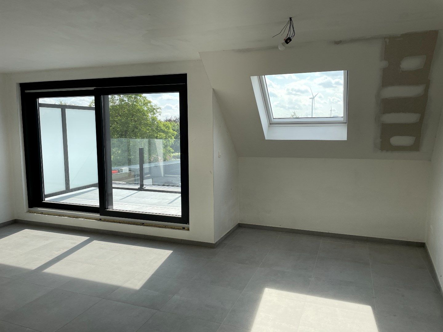 Bijzonder ruim appartement te Kluizen foto 4