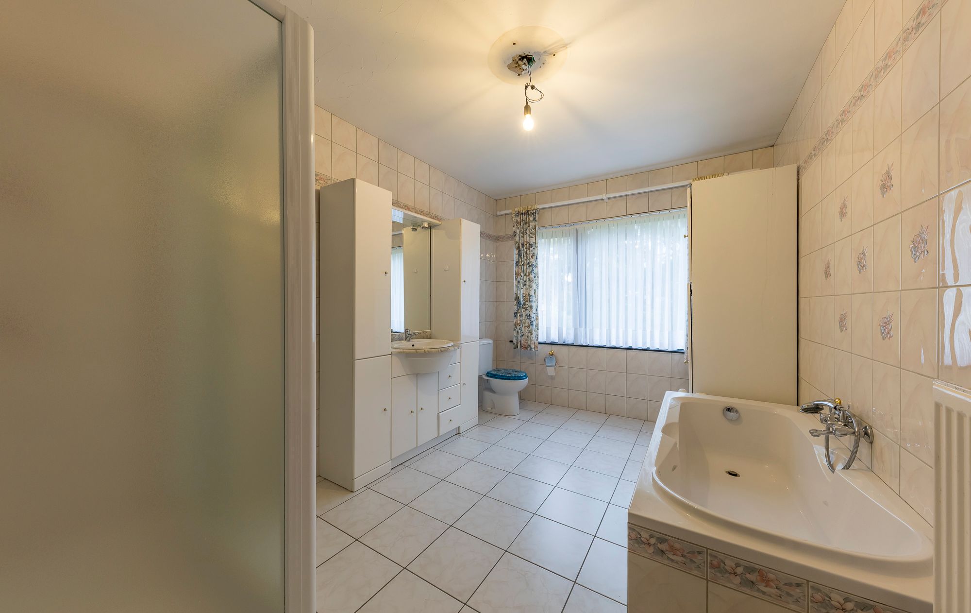 TE KOOP: Te renoveren gezinswoning met ruime tuin in Opglabbeek (Oudsbergen) foto 7