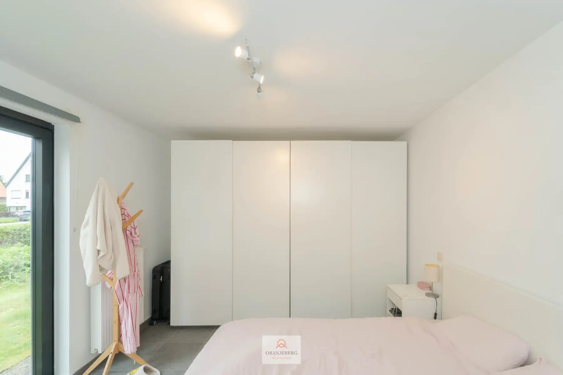 Gelijkvloers 2 slaapkamerappartement met ruime tuin foto 15