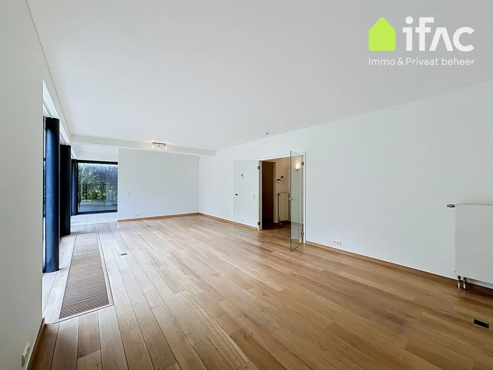 Exclusief gelijkvloers appartement met 2sk en privé tuin foto 5