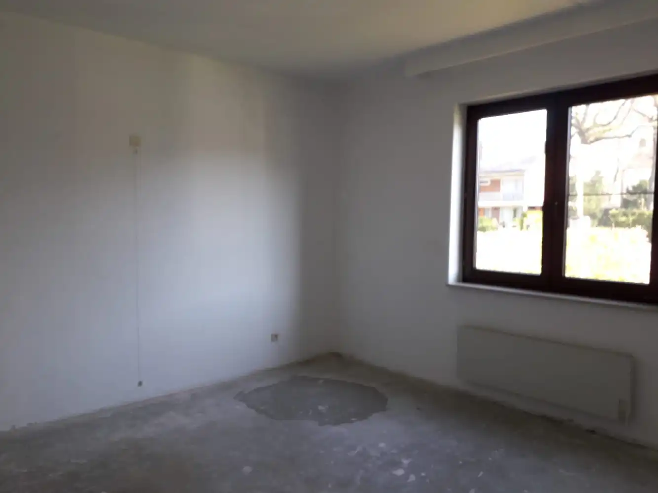 Volledig gerenoveerd gelijkvloers appartement met terras, berging en afgesloten garage foto 11