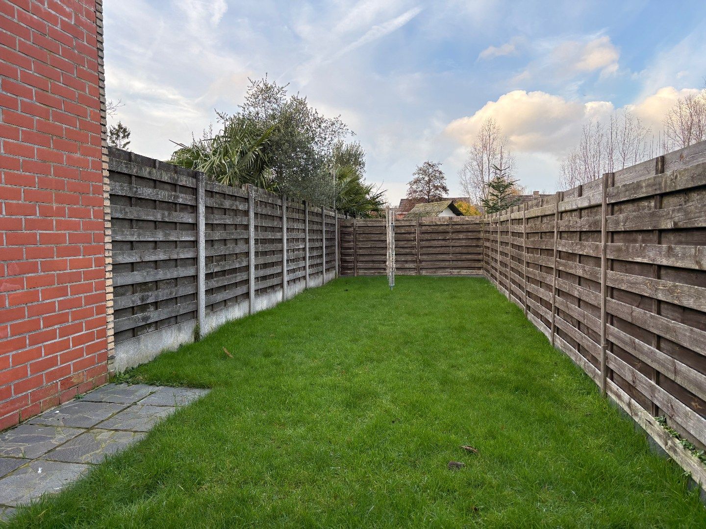 Woning dichtbij centrum Kuurne met parkeerplaats, gezellige tuin. foto 8