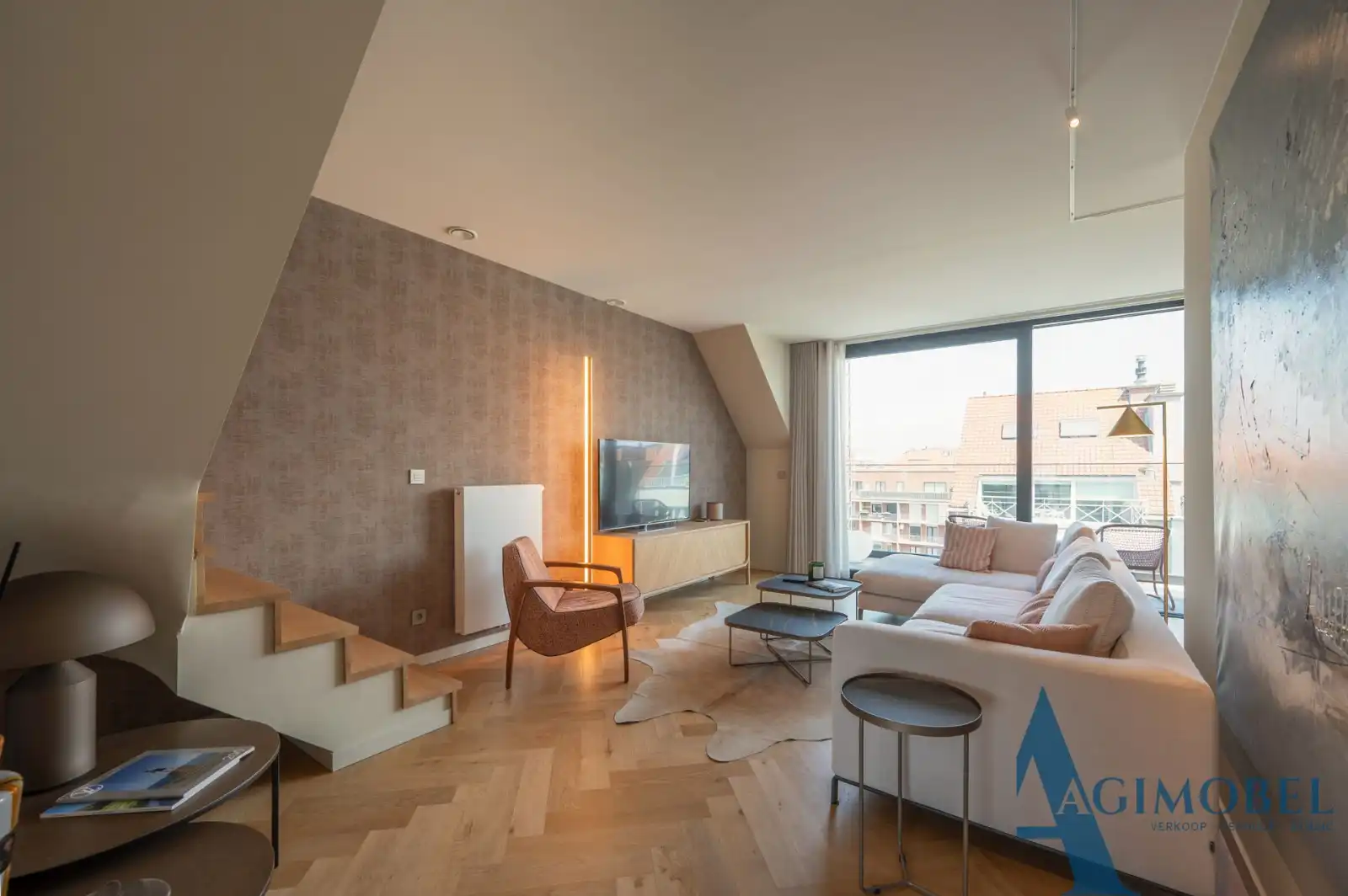Exclusieve duplex penthouse met  ware vijfsterrenbeleving op een boogscheut van de Zeedijk. foto {{pictureIndex}}