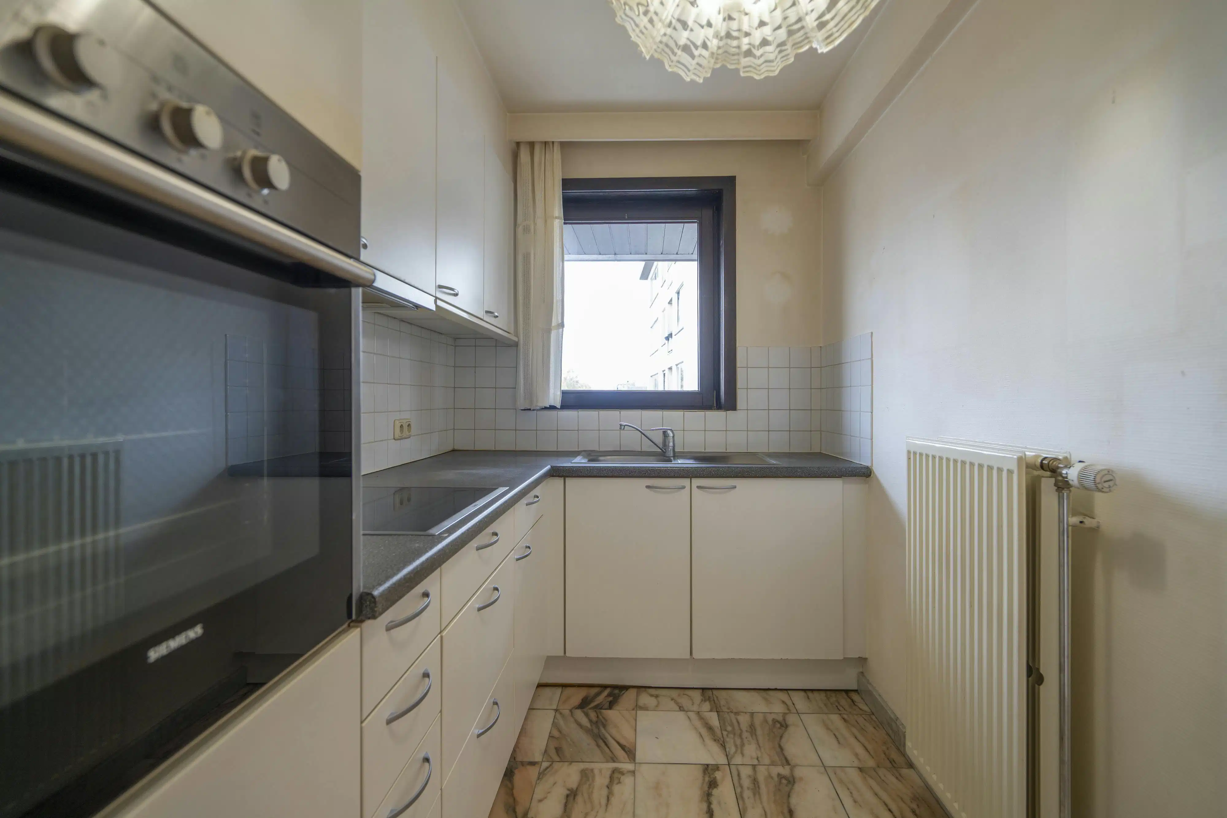 Te koop: lichtrijk 2-slaapkamerappartement in Kortrijk foto 7