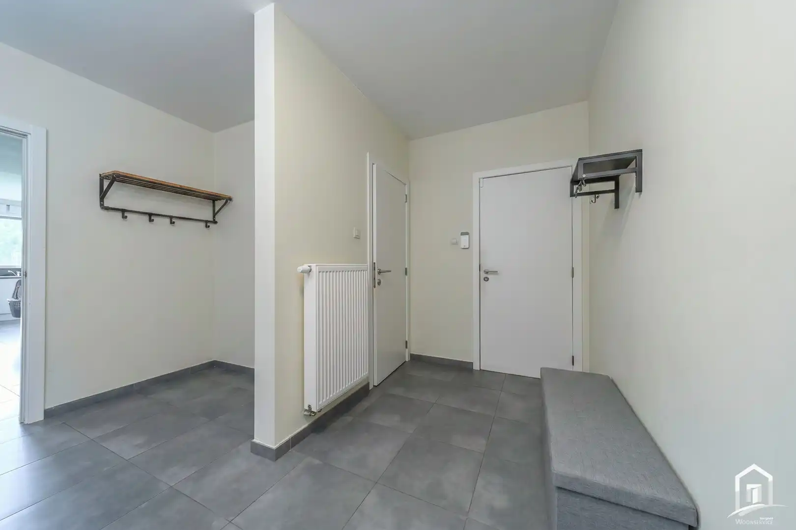 Ruim gelijkvloers appartement met 2 slaapkamers en tuin ! foto 11