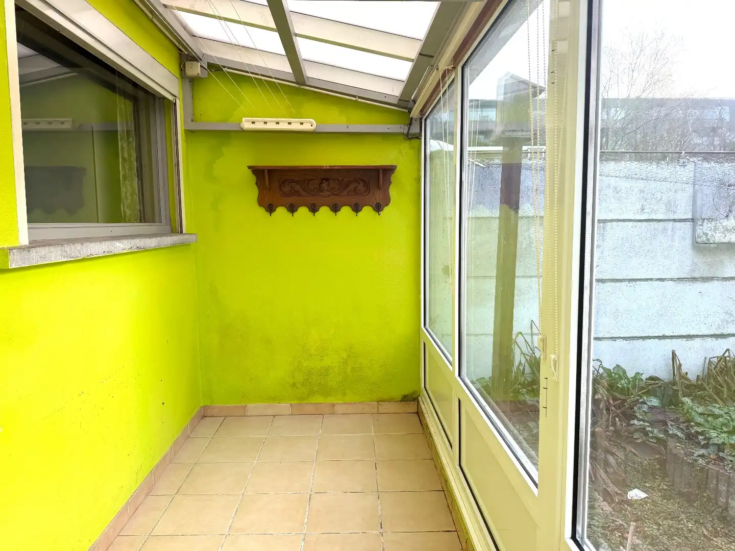 Te renoveren rijwoning met 4 slaapkamers en tuin in Kortrijk foto 8