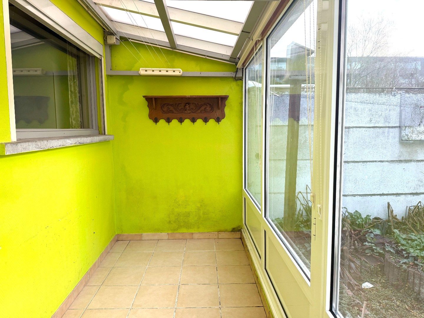 Te renoveren rijwoning met 4 slaapkamers en tuin in Kortrijk foto 8