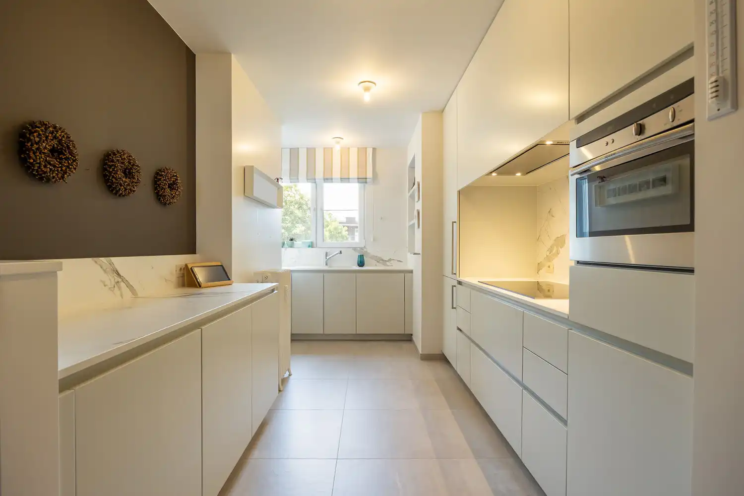 Energiezuinig (EPC B) en hoogwaardig gerenoveerd art-decoappartement met 2 slaapkamers, terras en gelijkvloerse polyvalente ruimte op absolute toplocatie aan ’t Groen Kwartier foto 20