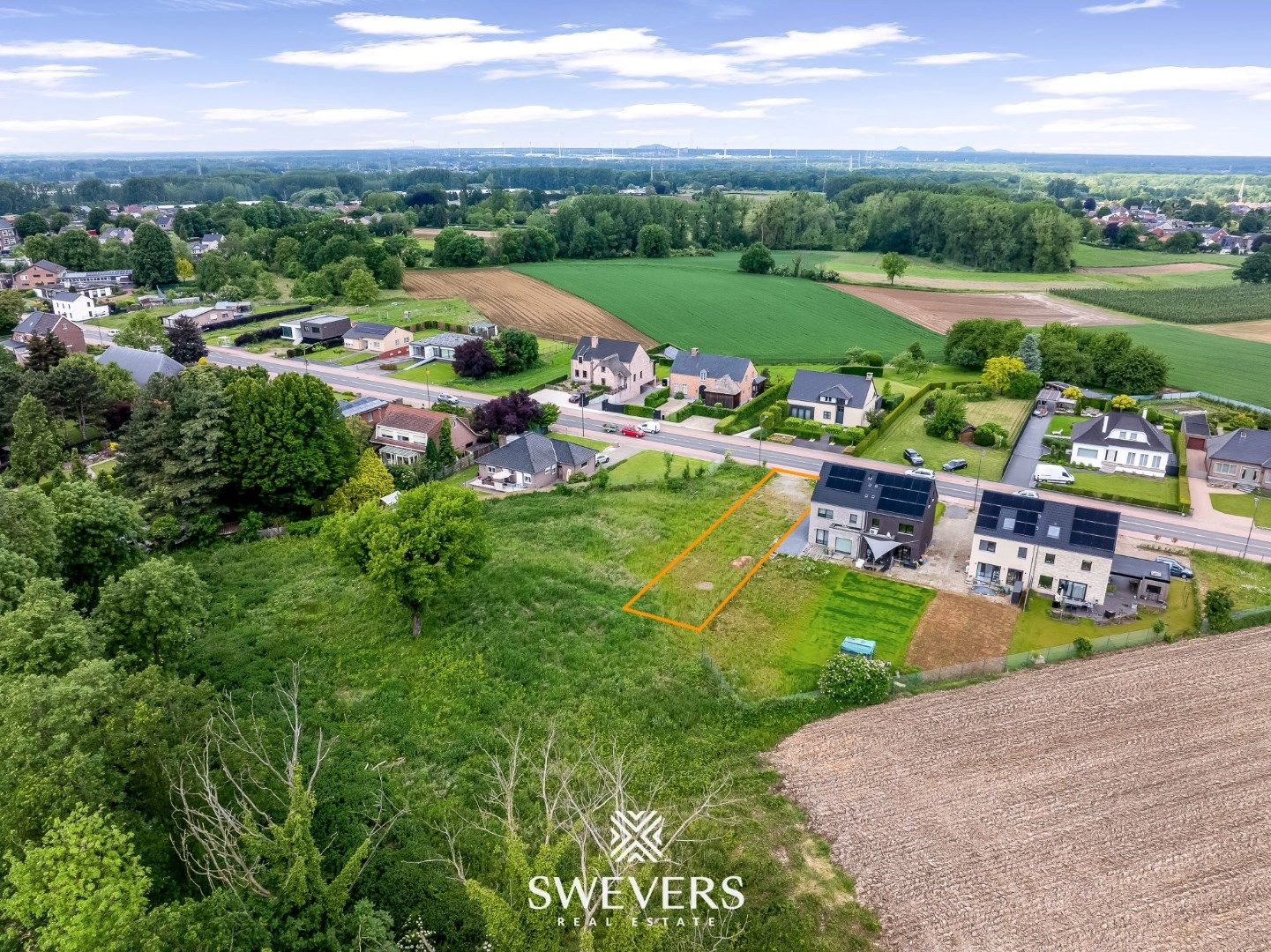 Zuidelijk georiënteerde bouwgrond van 5a in Bilzen foto 6