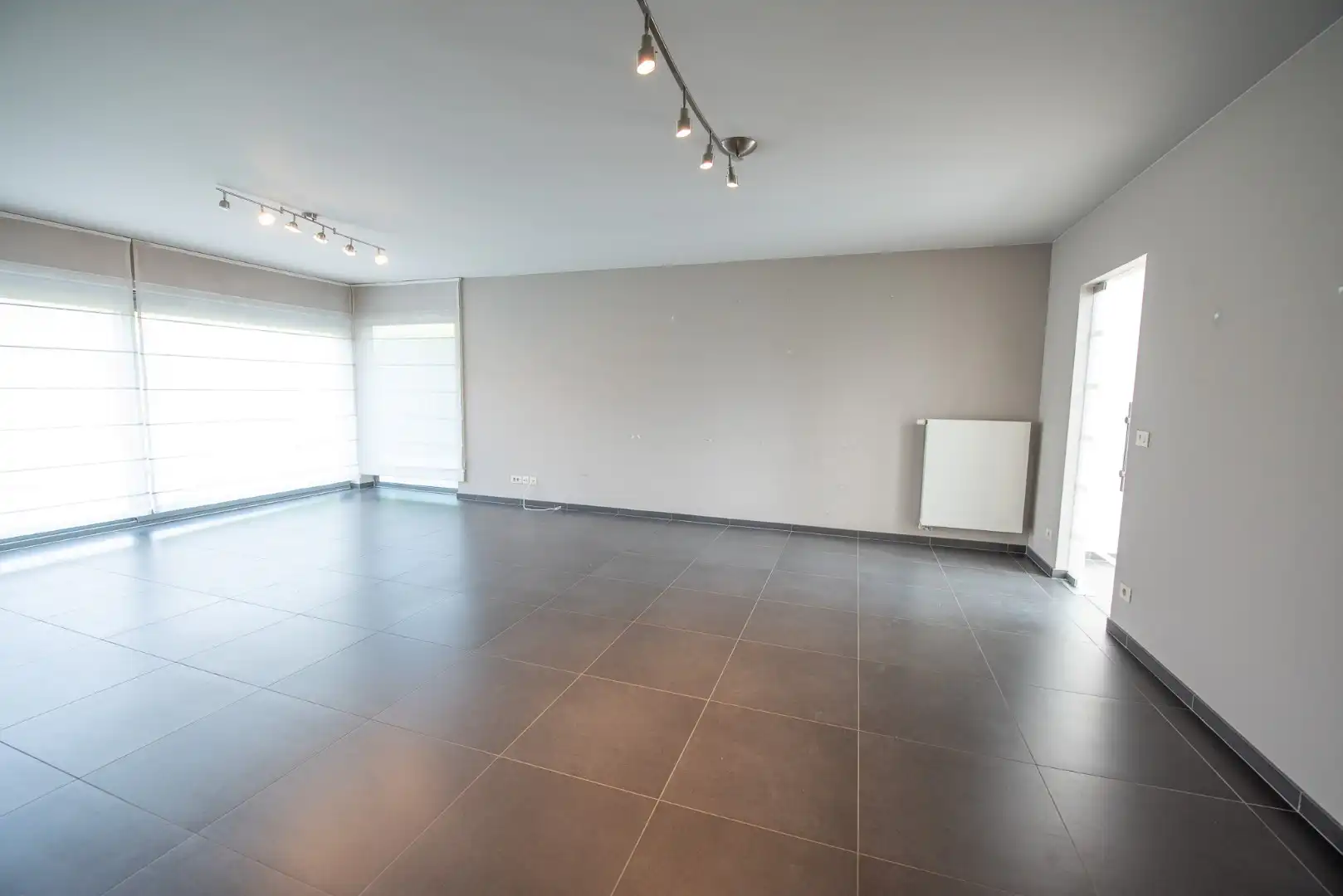 Rustig gelegen, ruime woning met 3 slaapkamers te Oeselgem! foto 8
