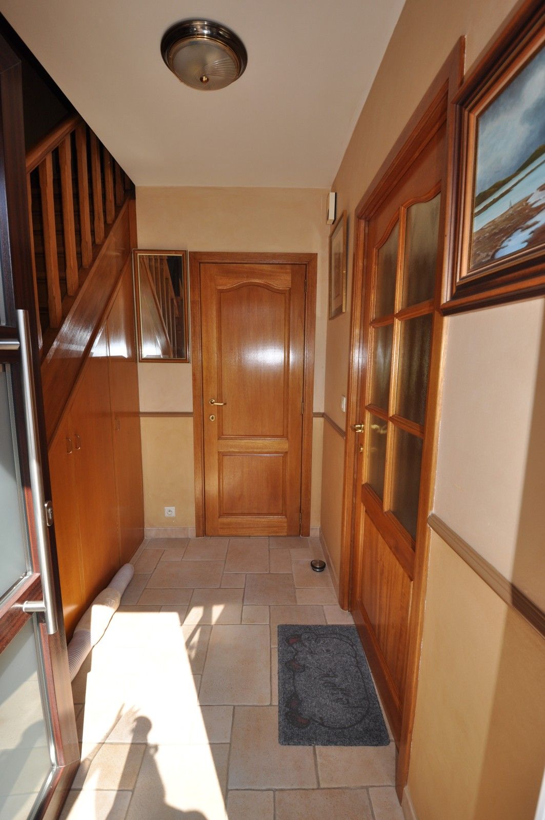 Ruime verzorgde woning met grote tuin en garage ! foto 3