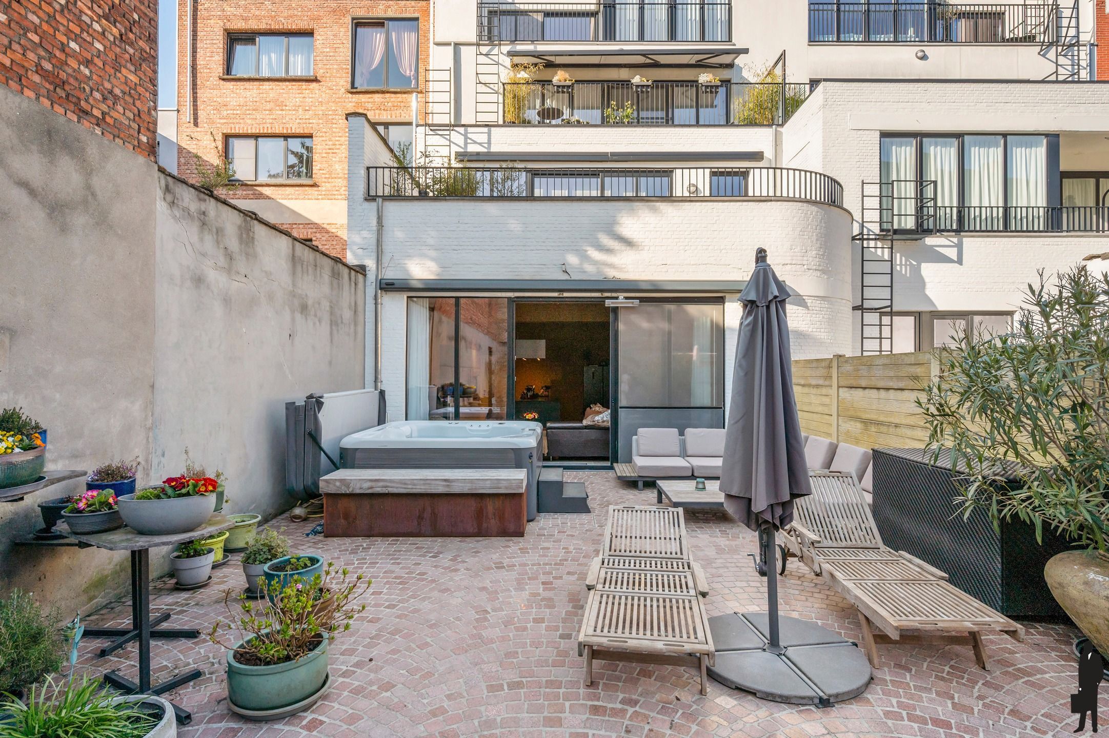 Exclusief gelijkvloers appartement met hoogwaardige afwerking en unieke stadstuin (230m²) foto 32