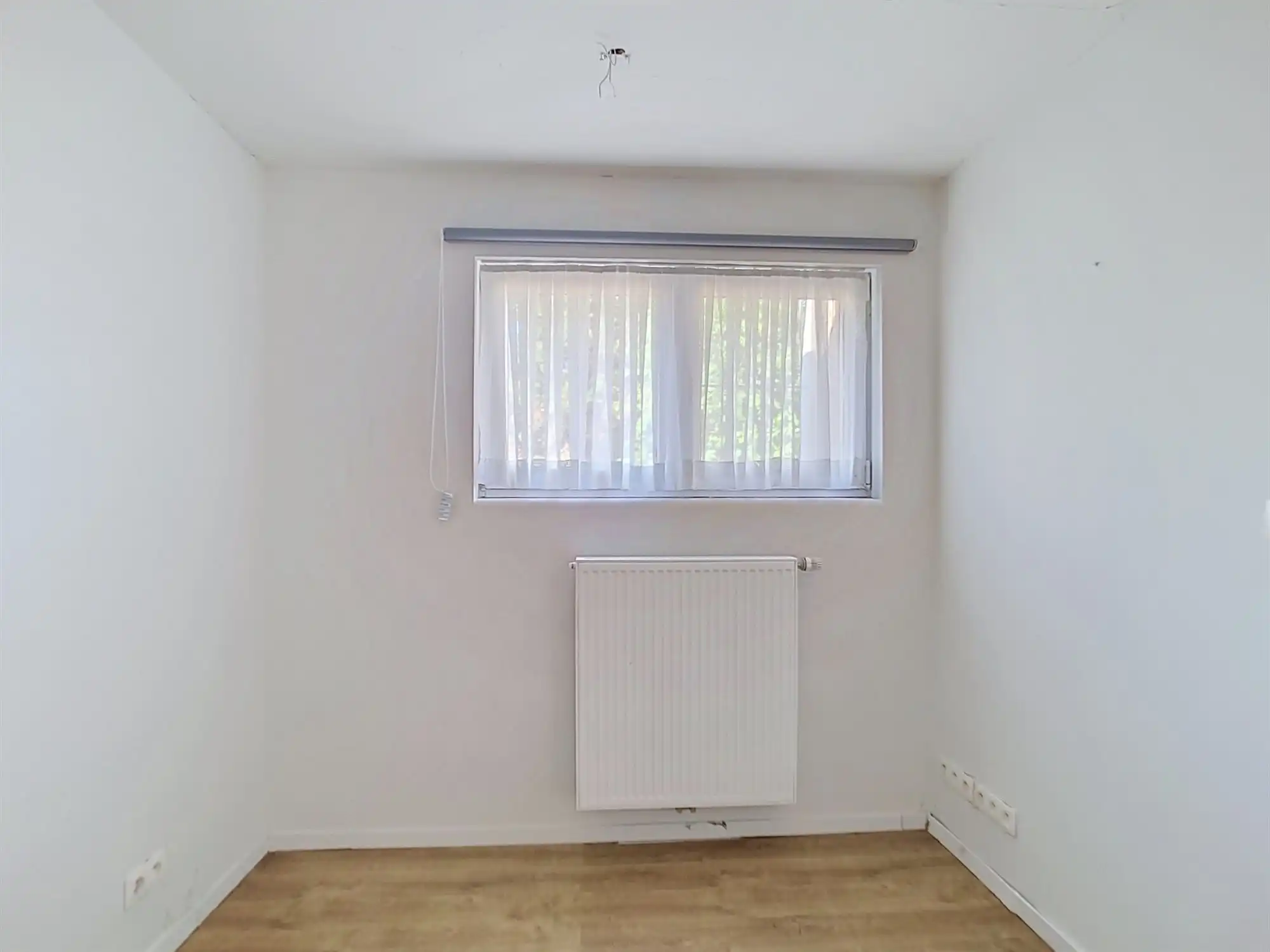 Gelijkvloers appartement met 2 slaapkamers, polyvalente ruimte en garage foto 12