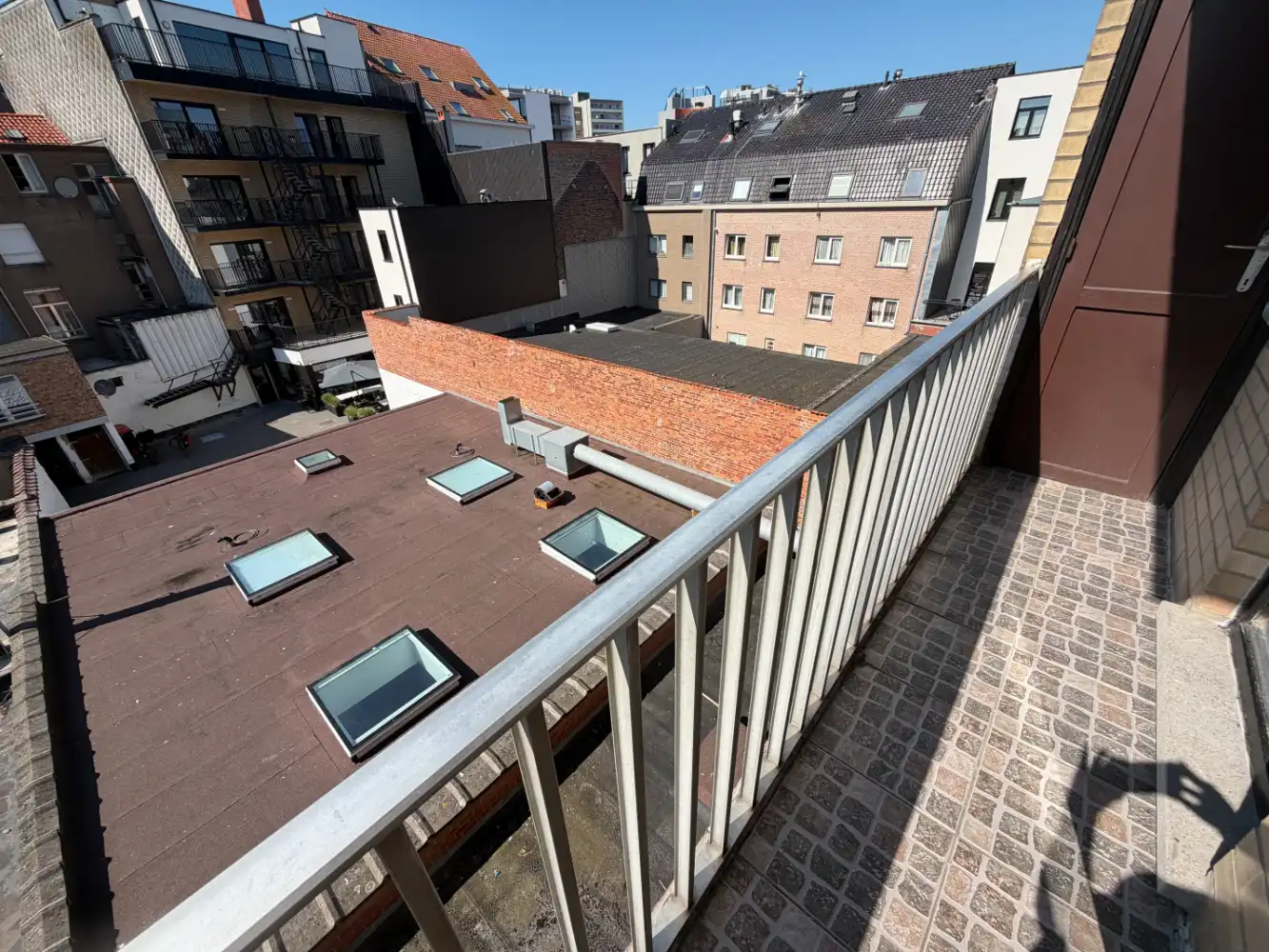 Ruim appartement te huur op de Grote Markt in Blankenberge met twee slaapkamers. Met een terrasje vooraan en achteraan- uw ideale uitvalsbasis aan de Belgische kust! foto 16