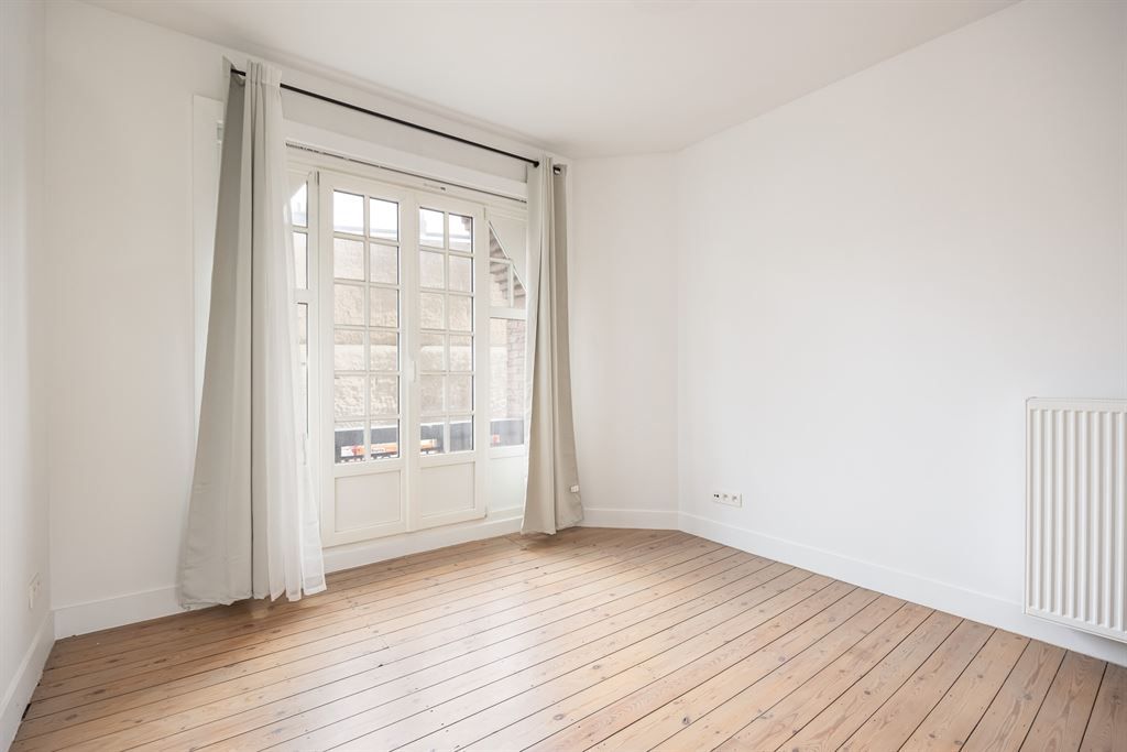 Charmant éénslaapkamer appartement met tuin foto 8