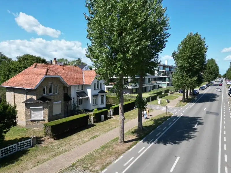 Unieke kans in Oostduinkerke-Bad – twee koppelwoningen met potentieel! foto 2