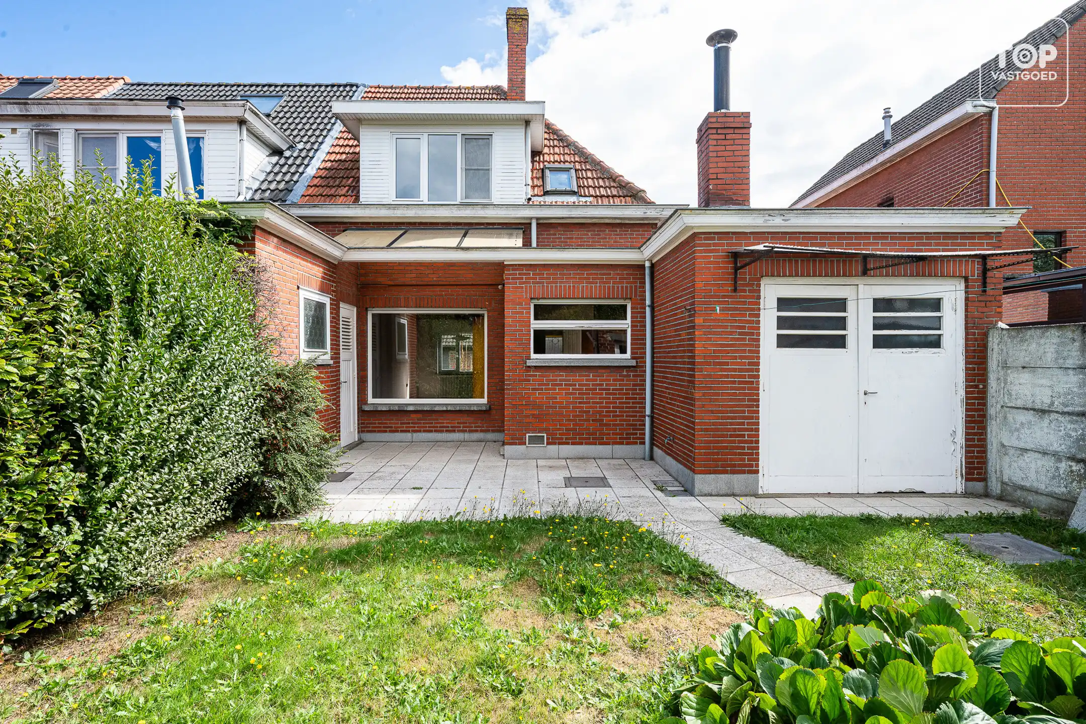 Te renoveren halfopen bebouwing met 3 slaapkamers, garage en ruime tuin op perceel van +-600 m² foto 21