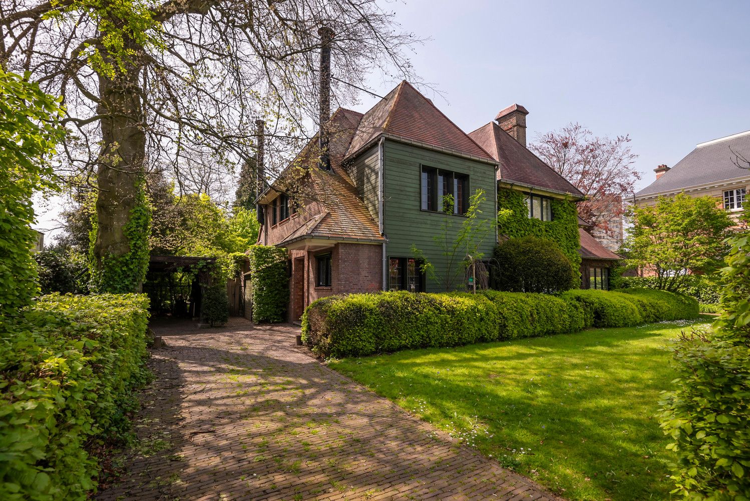 Halfopen-villa met prachtige tuin op absolute toplocatie aan Den Brandt te Wilrijk foto 1