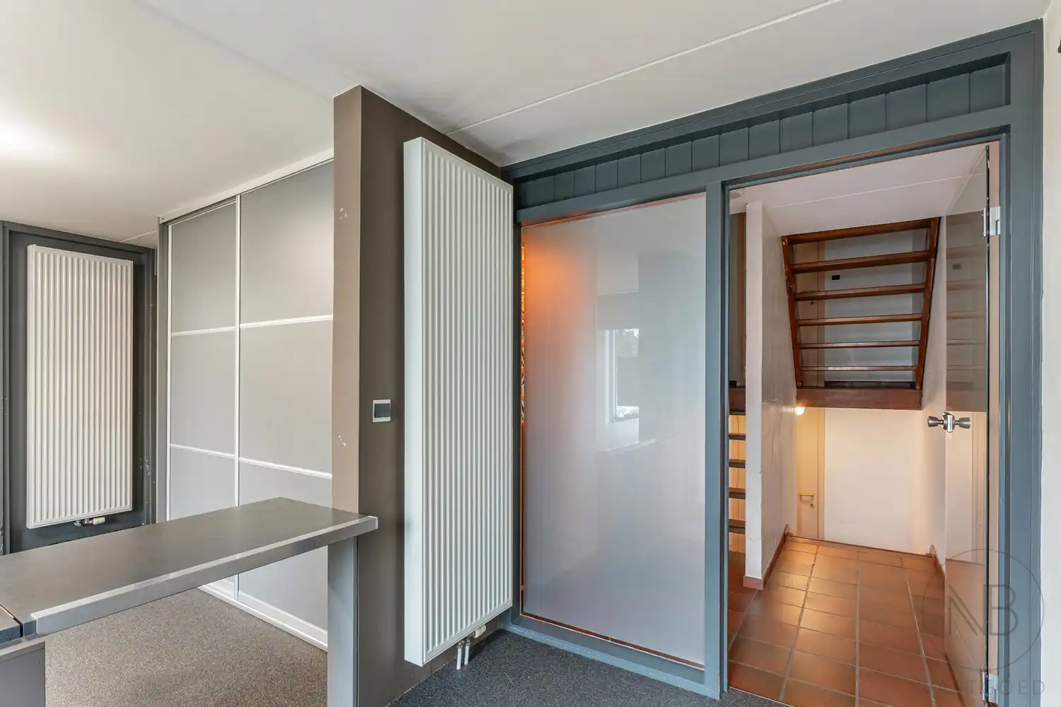 Pand met vergunde praktijkruimte, woonst, garage en carport in Opglabbeek foto 4