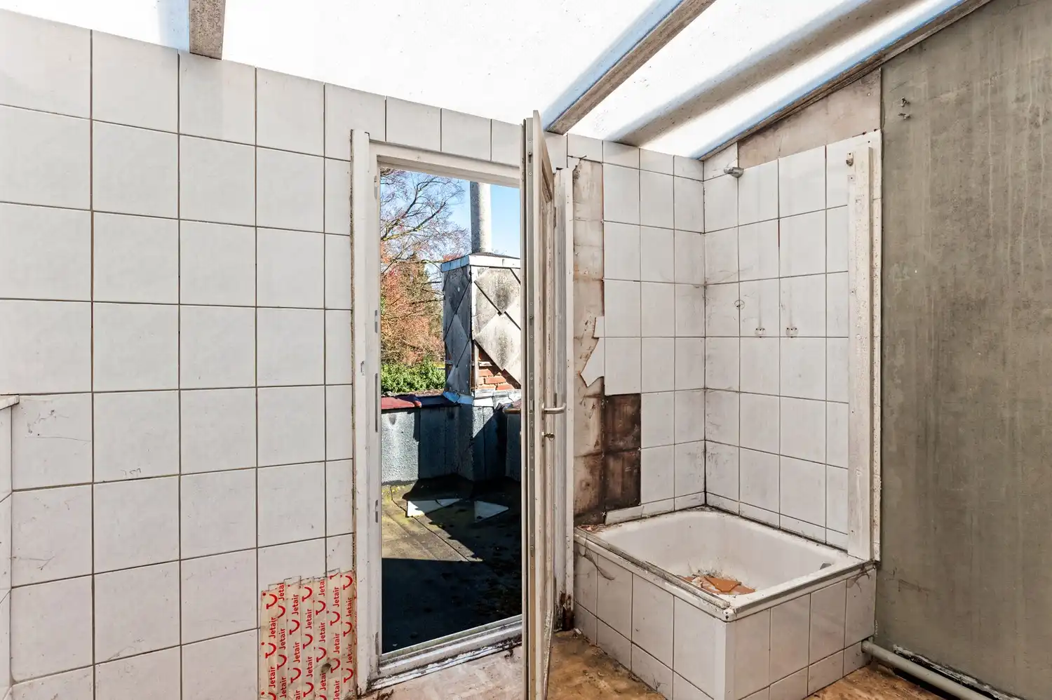 Handelsgelijkvloers met bovenliggend appartement in het centrum van Wommelgem! foto 17