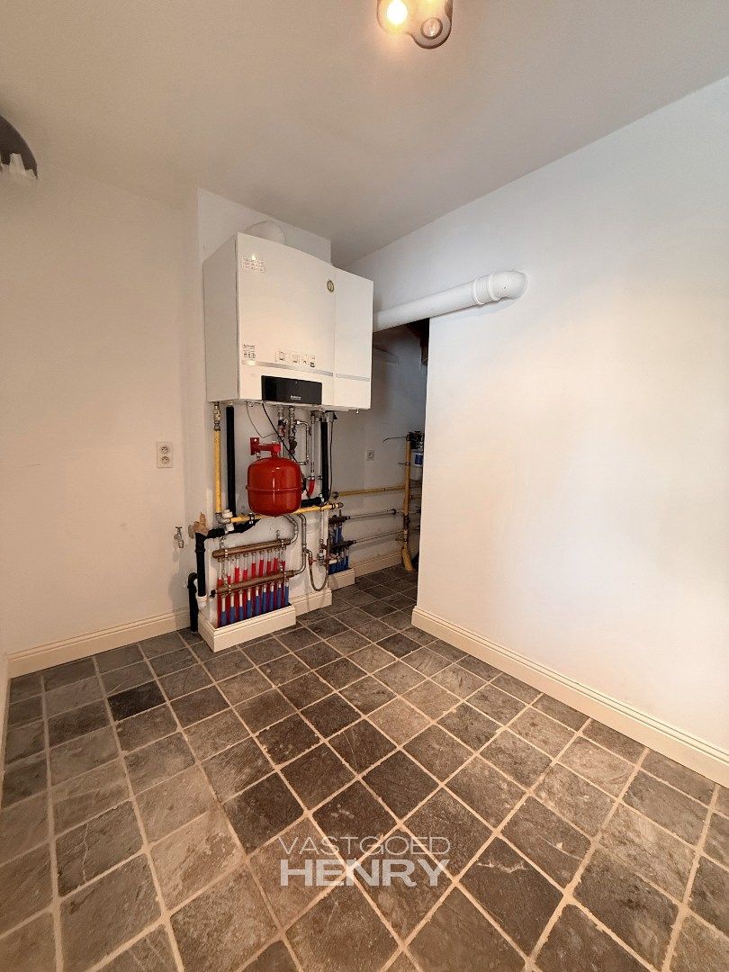 Volledig gerenoveerde woning met karakter foto 23