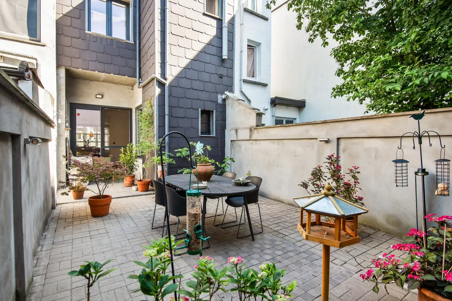 Instapklare woning met gezellige stadstuin foto 24