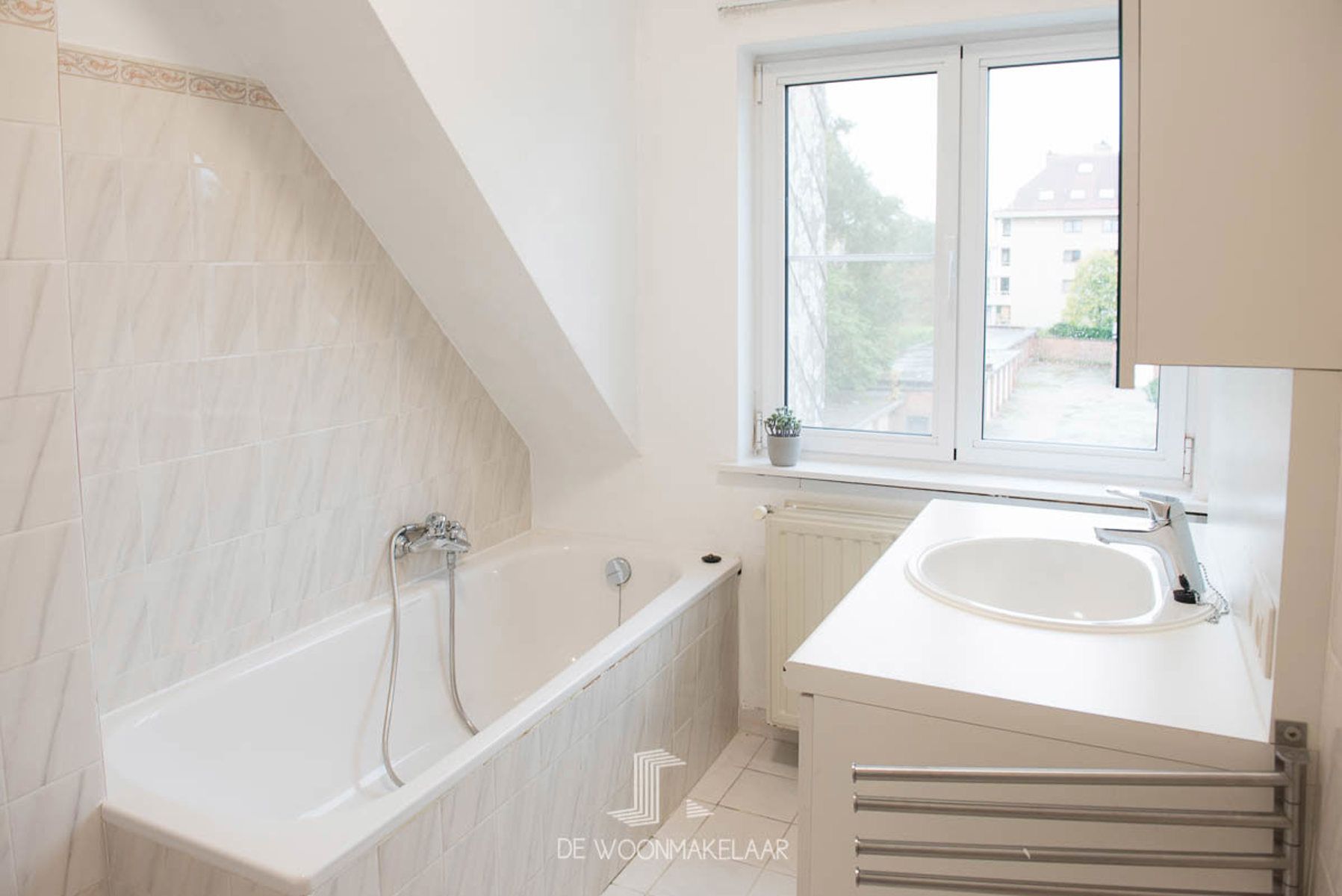 Bel-etage woning met 3 SLK, garage en tuin op toplocatie foto 12