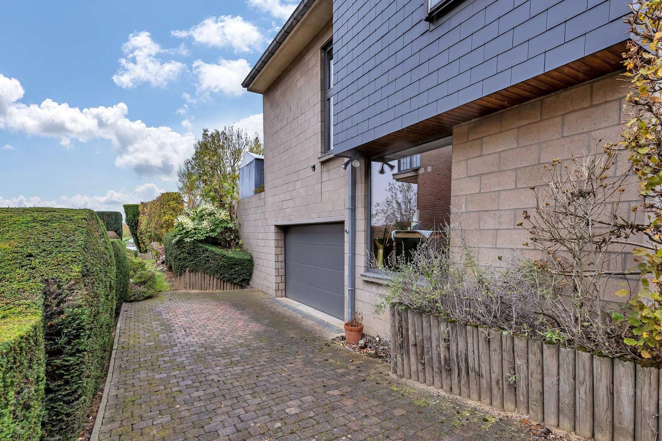 Architecturale woning met 4 slaapkamers, tuin en garage! foto 23