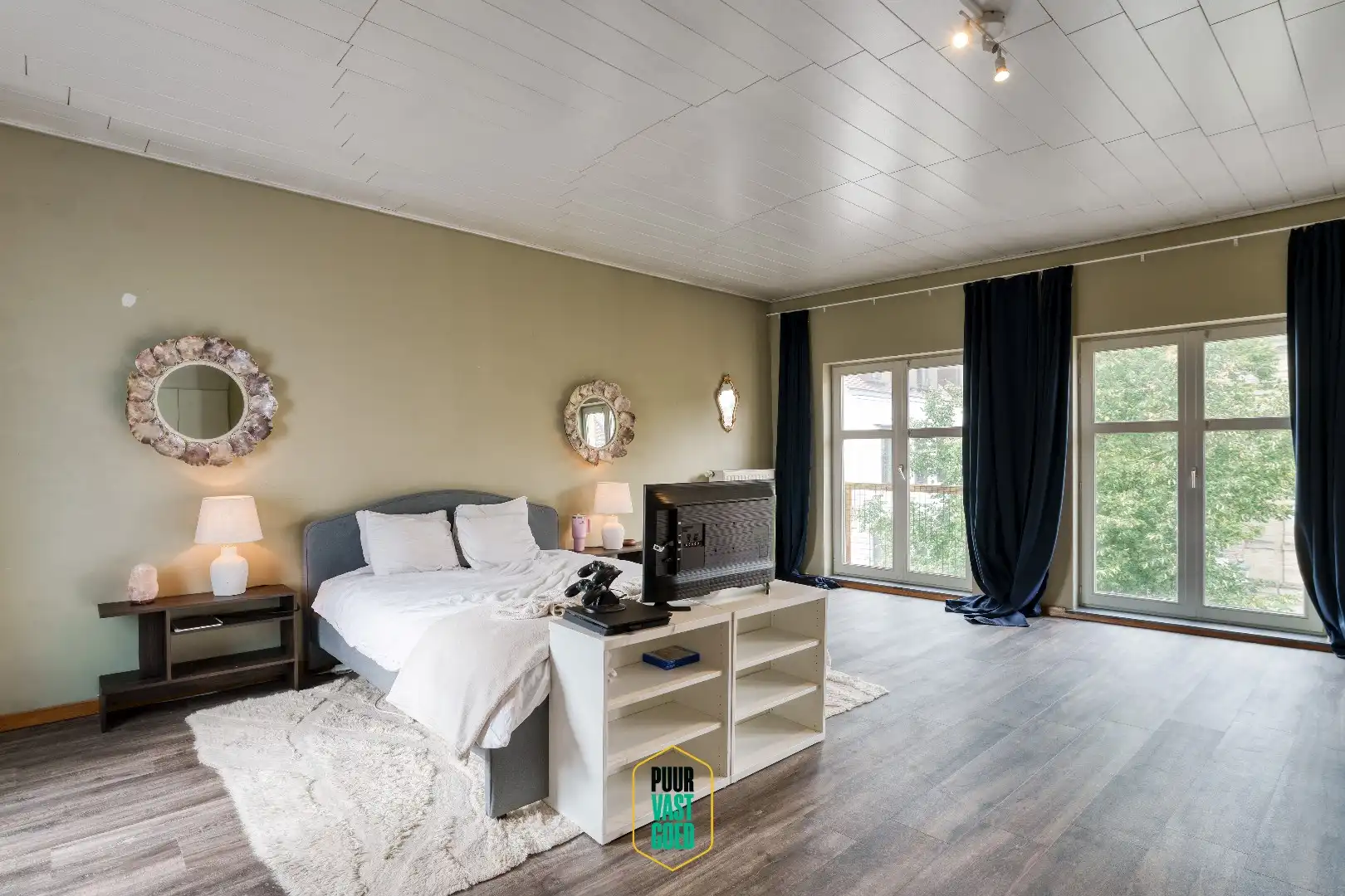 Riant appartement en studio boven grote handelsruimte  foto 24