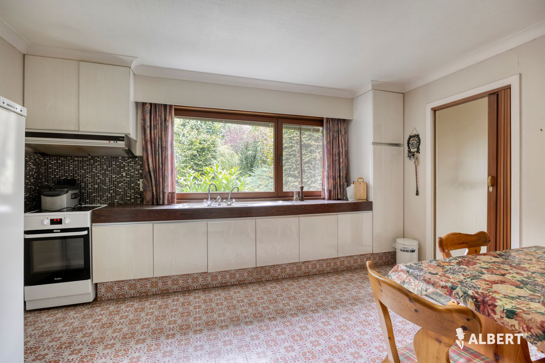 Gelijkvloerse woning op riant perceel met 3 slaapkamers foto 6