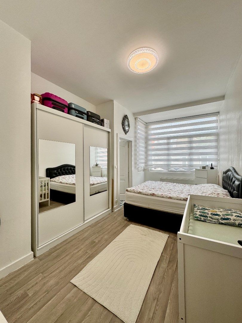 Licht en ruim 2-slaapkamerappartement te koop in Laken foto 20