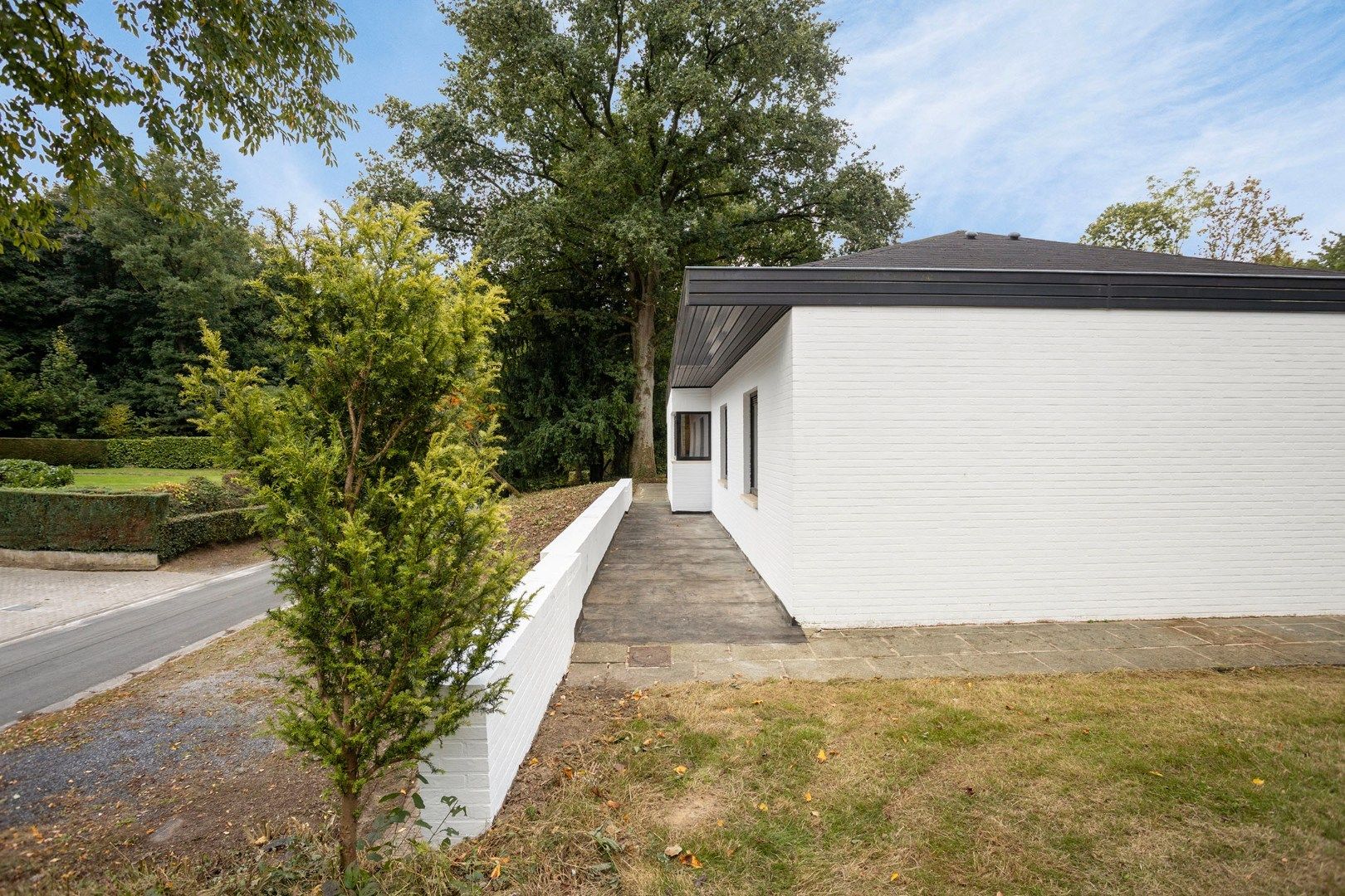 Ruime woning in een doodlopende straat met 4 slaapkamers, 2 badkamers op een prachtig perceel vlak bij het Meerdaalwoud  foto 32