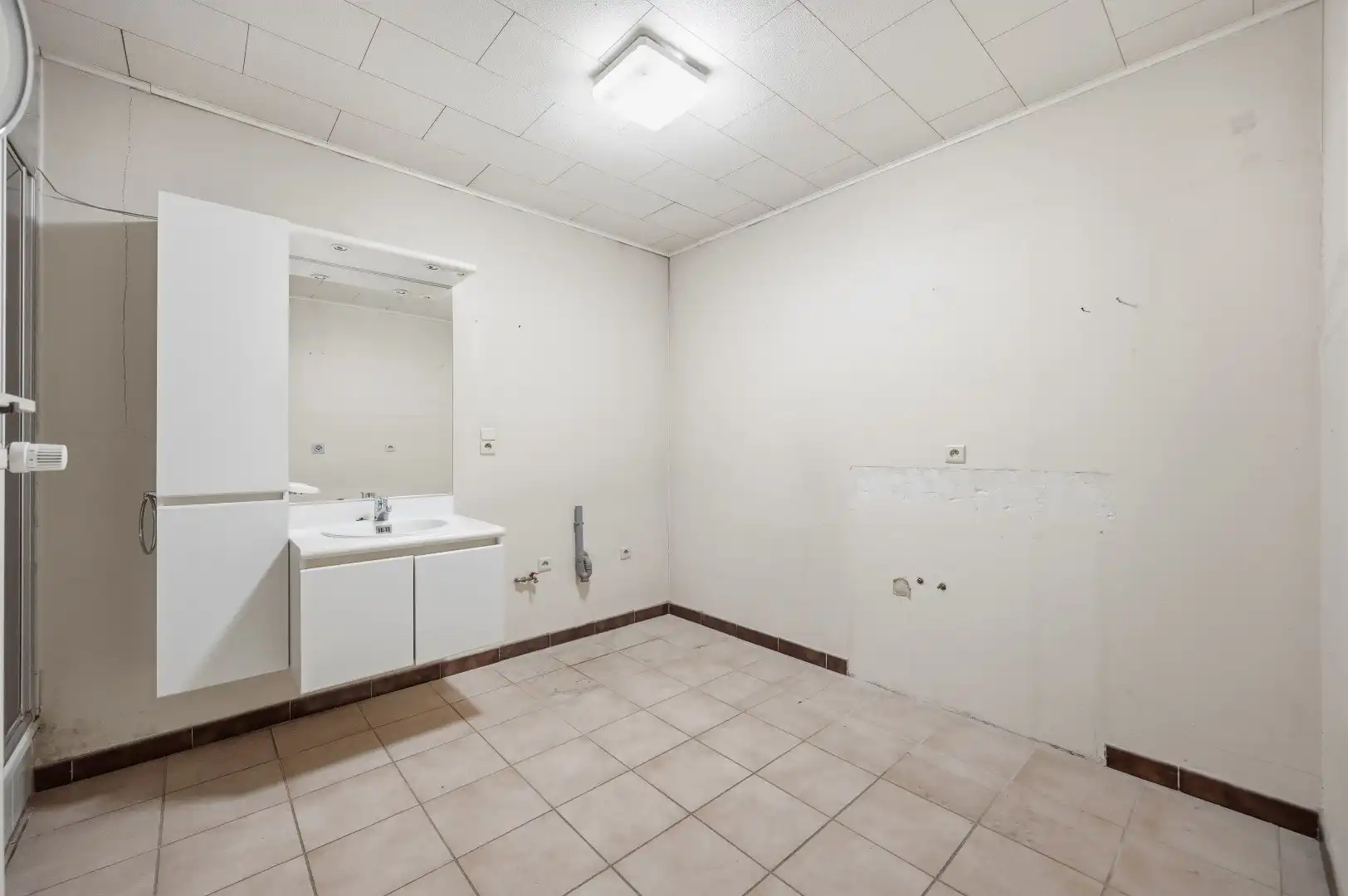 1 rijwoning en 2 appartementen in gezellig Hoegaarden foto 7
