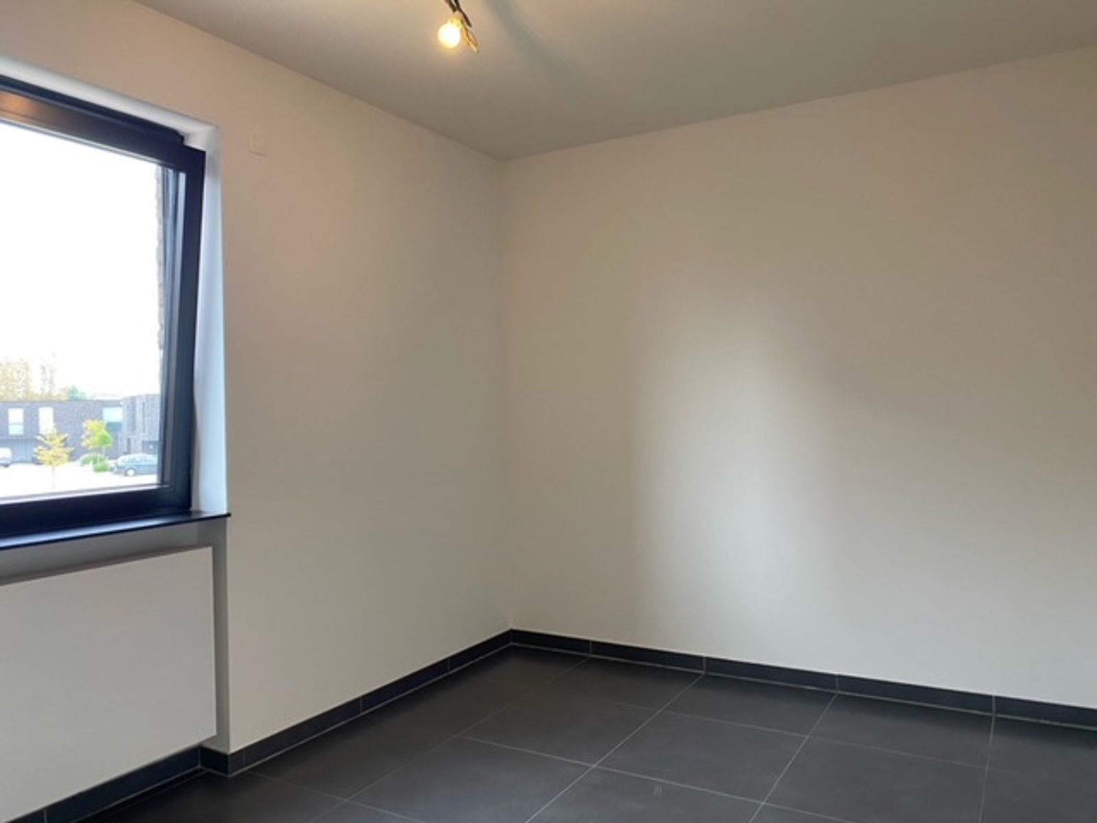 RUIM APPARTEMENT (71,35m2) MET 1 SLK, ONDERGRONDSE AUTOSTANDPLAATS EN KELDERBERGING TE HASSELT foto 8