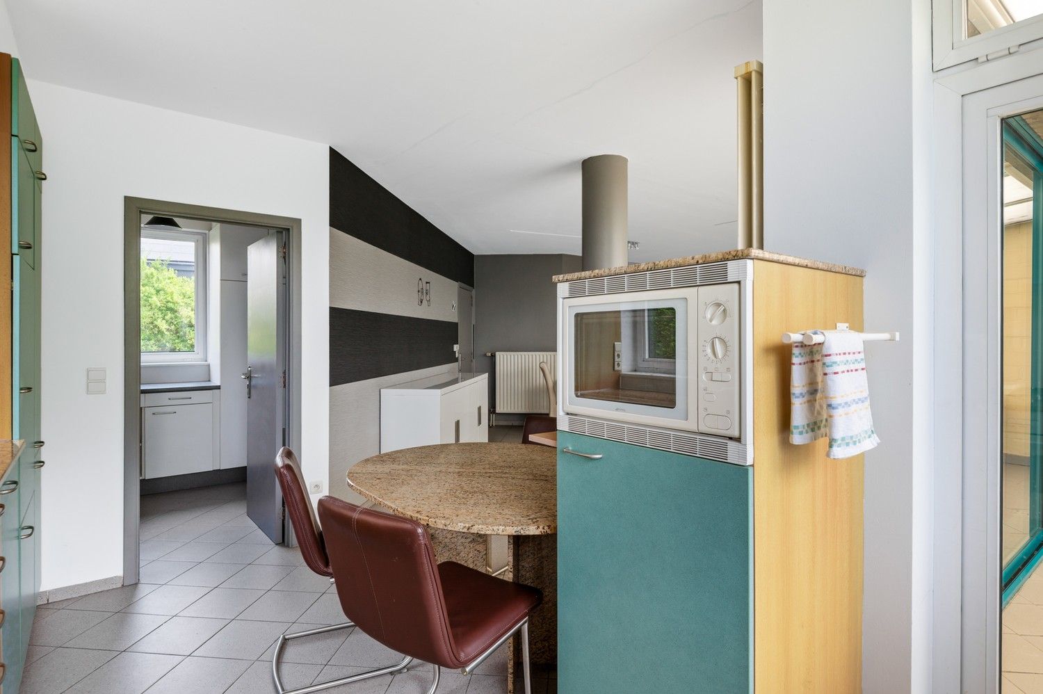 Ruime halfopen bebouwing met zuidwest georiënteerde tuin te Lint foto 8