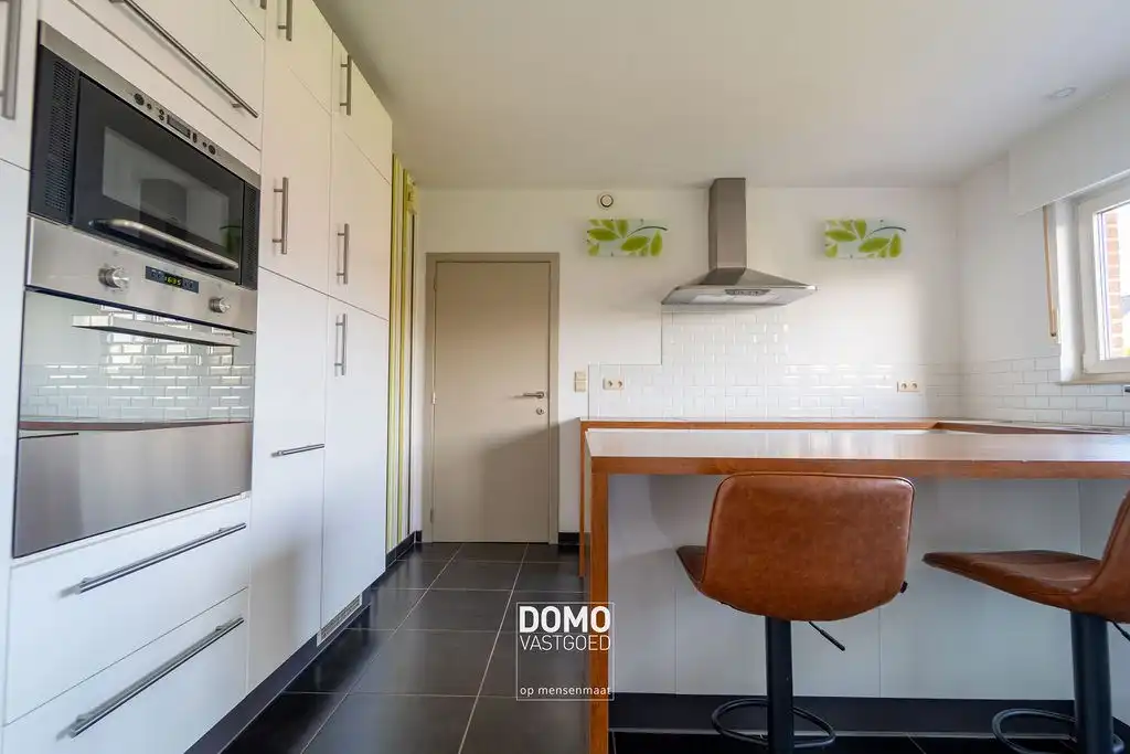 Wonen in alle rust: instapklare open bebouwing met ruime zonnige tuin te Stokrooie foto 8