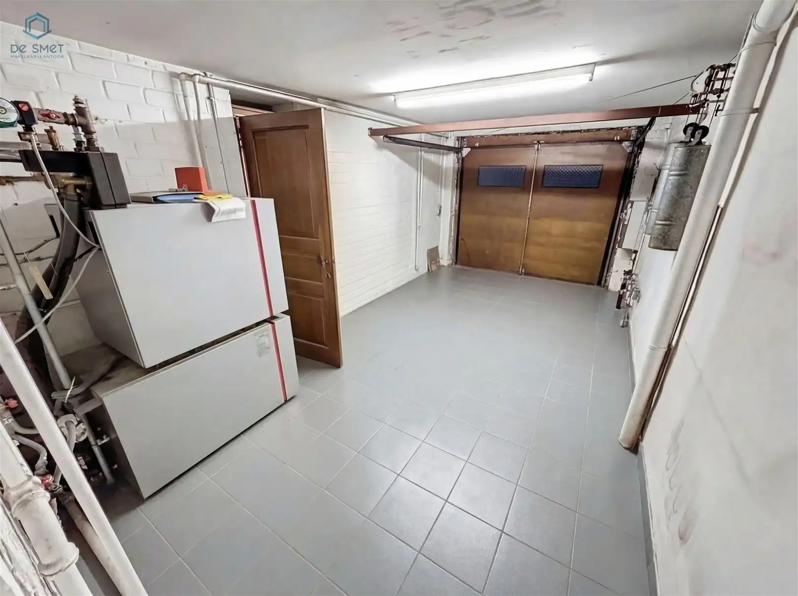 Te renoveren woning met 4 slaapkamers, garage en tuin op toplocatie in Denderleeuw foto 10