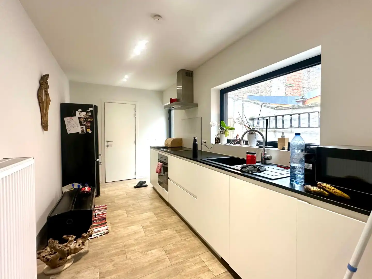 Knusse rijwoning op toplocatie foto 5