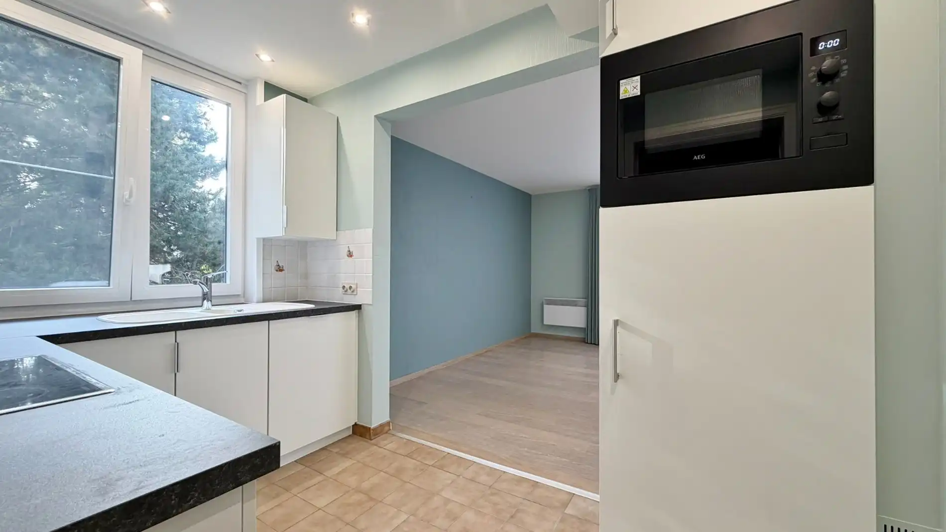 Ruim en lichtrijk appartement met garage, terras en open zicht foto 6