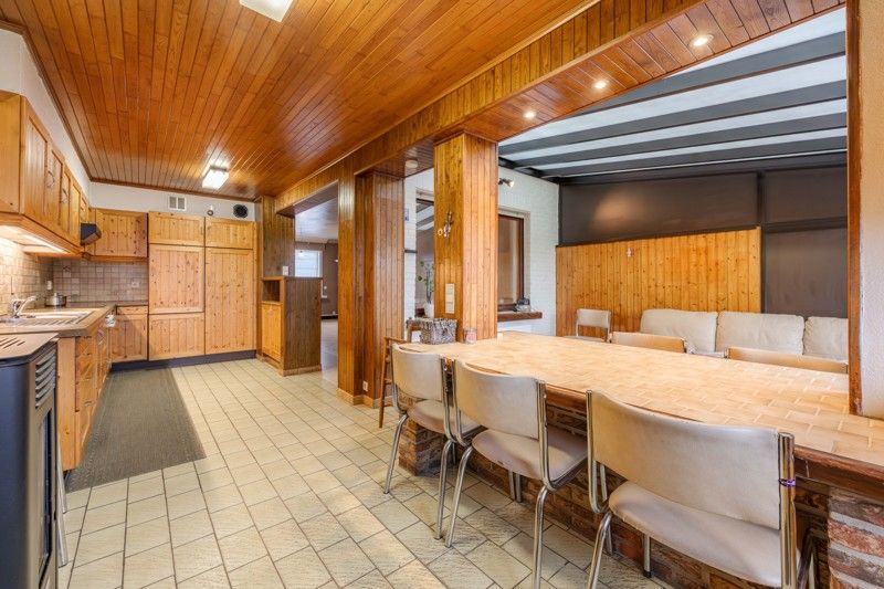 Te renoveren, rustige gelegen halfopen woning met 3 slaapkamers, garage en tuin te koop in Sint-Baafs-Vijve! foto 9