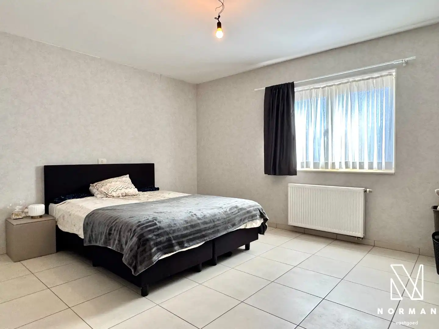 Gelijkvloers, instapklaar 2-slaapkamer appartement te koop met terras in centrum Bavikhove! foto 16