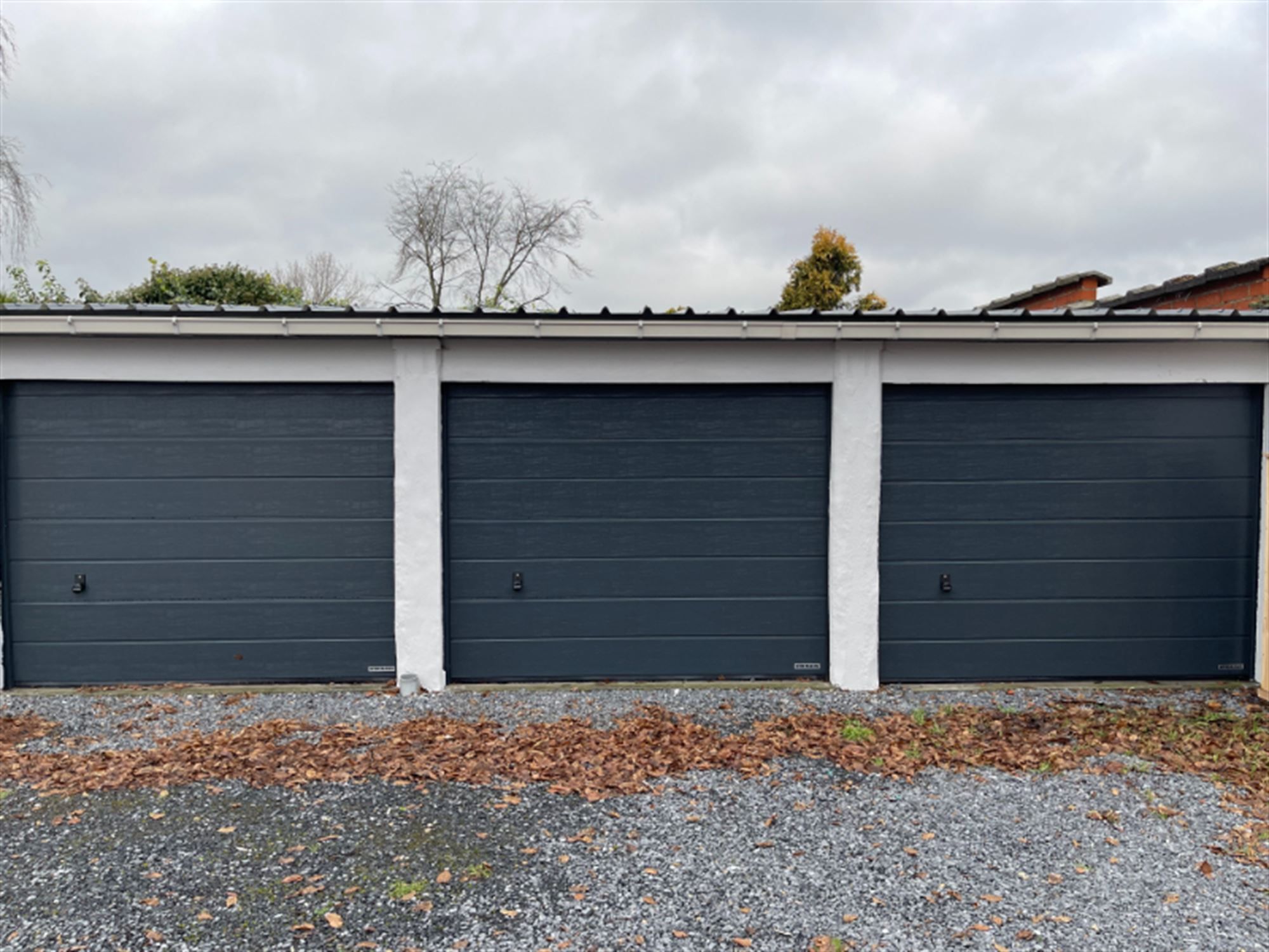 Garage foto {{pictureIndex}}