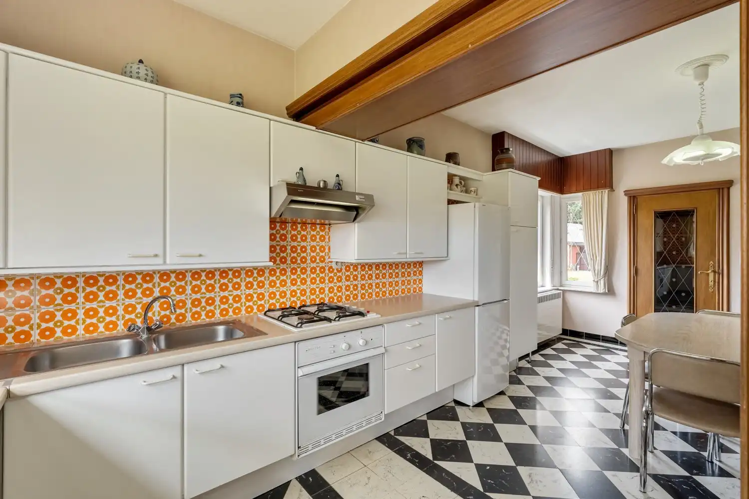 Te renoveren woning met 3 slaapkamers (en afgewerkte zolderkamer) op een perceel van 7 are 5 centiare te Gelrode. foto 9